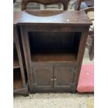 Small oak side cabinet with two doors to base