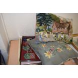 Two needlework cushions and a quantity of needlework pictures