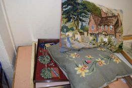 Two needlework cushions and a quantity of needlework pictures