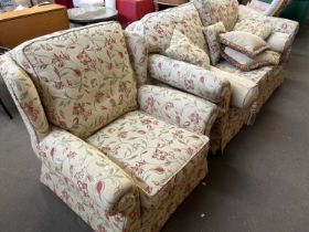 Floral upholstered two seater sofa and matching armchair