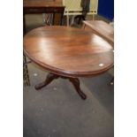 A mahogany breakfast table