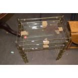 Set of three metal and glass topped nesting tables (a/f)