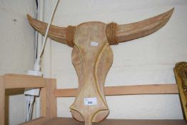 Carved wooden model of a bulls head and horns