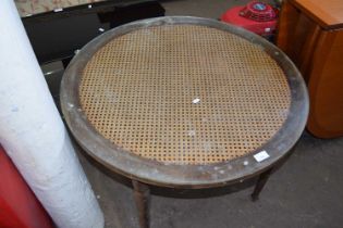 Rattan and glass topped round coffee table
