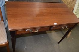 A stained pine two drawer side table
