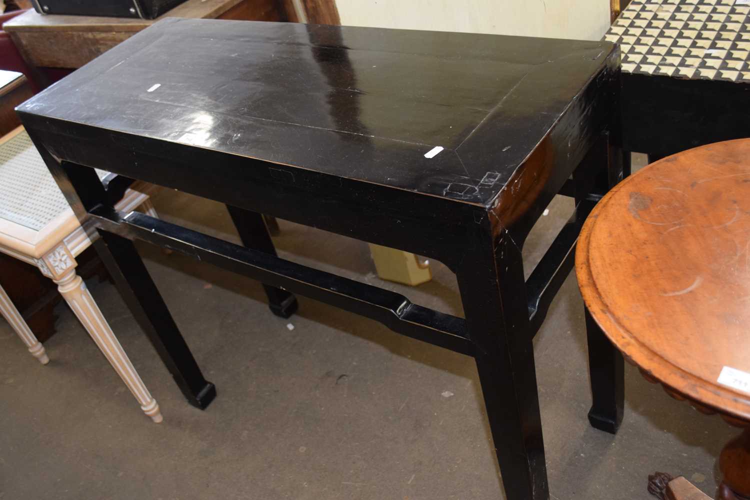 A Chinese style black painted side table