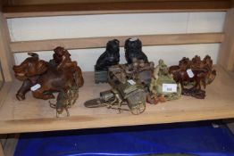 Quantity of Chinese carvings to include a pair of stone dogs of fo, carved water buffalo and