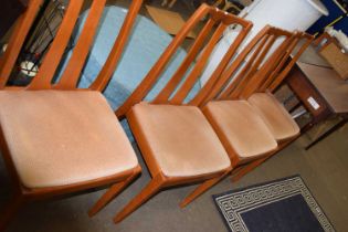 A set of four mid 20th Century dining chairs