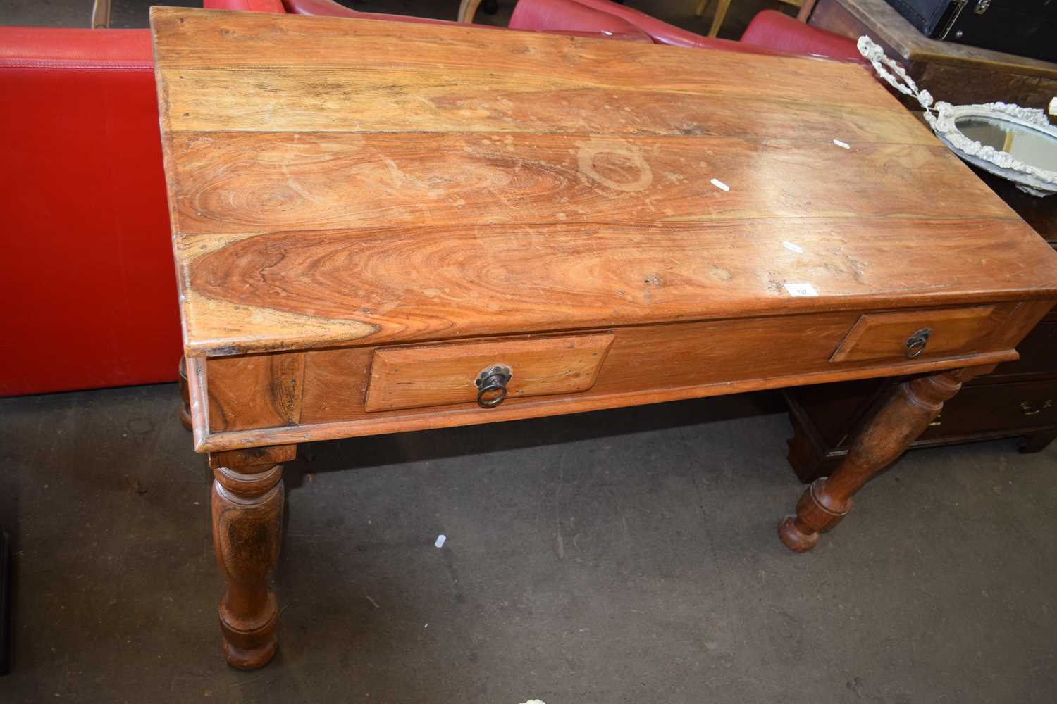 A two drawer side table on turned legs