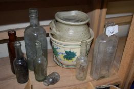 Quantity of vintage glass bottles and stone ware pots