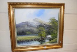 River with mountains beyond, oil on canvas in gilt frame