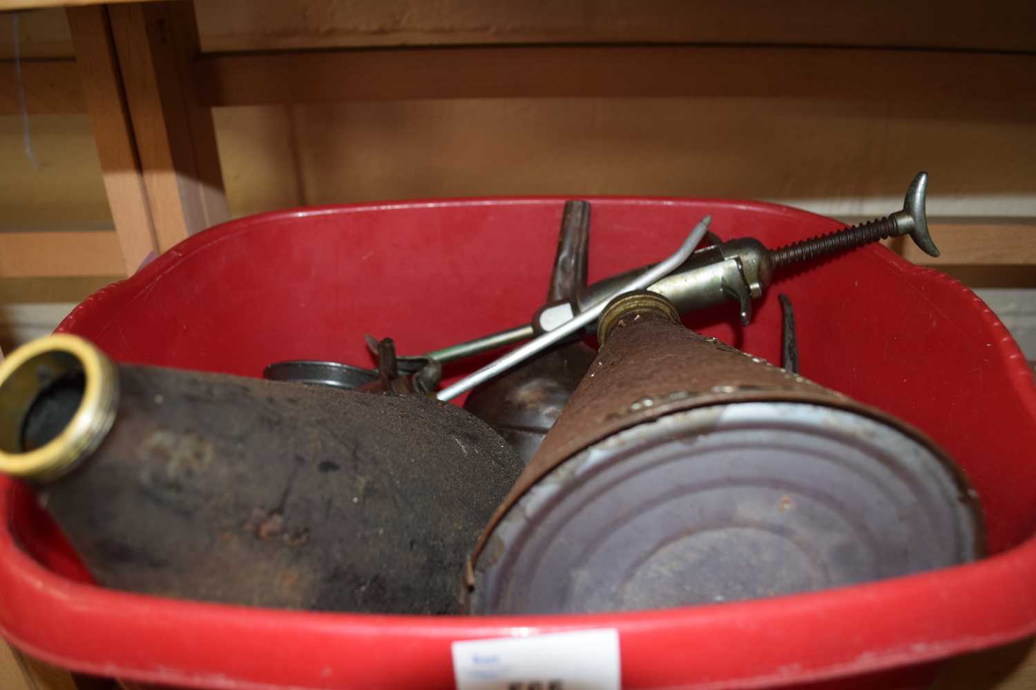 Quantity of vintage oil cans and other items