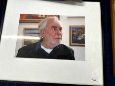 A framed portrait Photograph of Derek Inwood (1925-2012), framed and glazed. , , ,