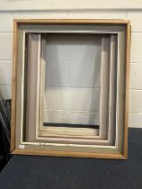 Four large wooden frames, various sizes. Largest 35x30''