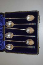 Set of six Korean white metal and enamel coffee spoons, stamped to the reverse Silver Korea