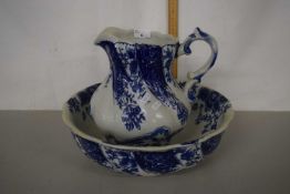 A blue and white wash bowl and jug