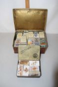 Two boxes containing a large collection of cigarette cards
