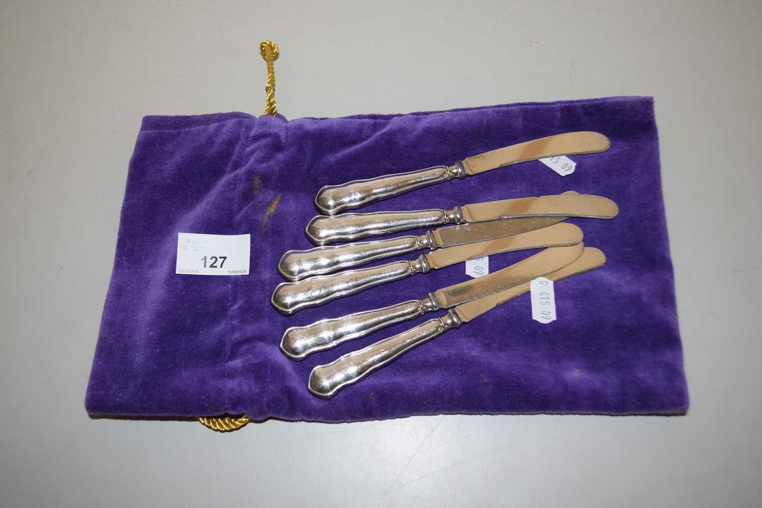 Set of six silver handled butter knives