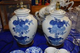 Pair of large blue and white fruit decorated table lamps