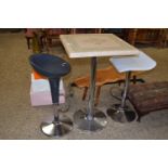 Modern metal base pedestal bar type table and two stools (3)