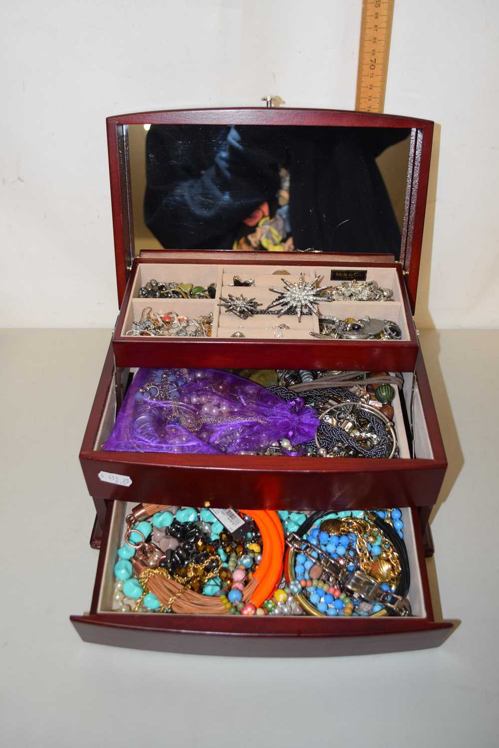 A cantilever jewellery box and various contents