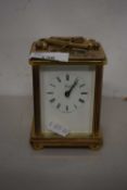Brass cased carriage clock by Henley