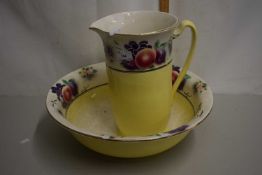 Fruit decorated wash bowl and jug