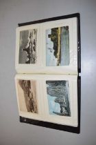 An album of various 20th Century postcards