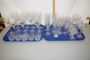 Two trays of modern drinking glasses