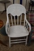 An early 20th Century white painted carver chair