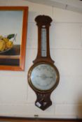 An oak cased barometer