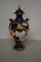 A small Royal Crown Derby gilt decorated covered vase