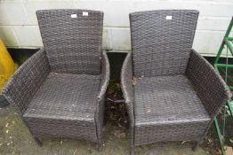A pair of modern polymer mesh work garden seats