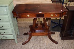 A Georgian style pedestal occasional table with two drawers and outswept legs