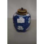 Small Chinese prunus pattern ginger jar with pierced wooden lid, 14cm high, double circle mark to