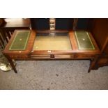 Modern mahogany display coffee table with leather covered side sections