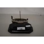 Continental 800 grade white metal miniature model of a boat (a/f)