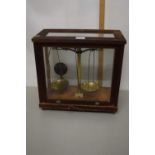 Brass chemists beam scales in glazed cabinet