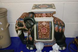 A pottery stool formed as an elephant