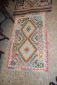 A small Killim rug with geometric design