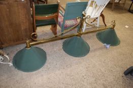 A brass framed triple ceiling light possibly from a snooker table, 170cm long
