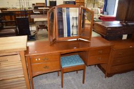 A Stag dressing table with triple mirror and stool