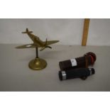 Vintage Astral telescope together with a brass model Spitfire