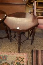 Late Victorian American walnut octagonal two tier occasional table on turned legs