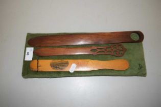 Group of three wooden paper knives