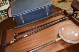 Group of three walking sticks to include an example with a cast brass jockey head finial
