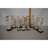 A collection of Florence figurines