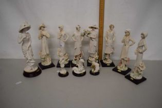 A collection of Florence figurines