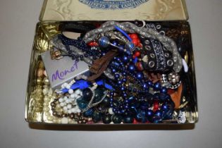 Tin of various assorted costume jewellery