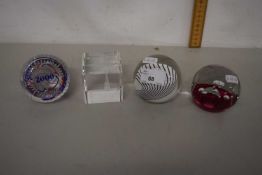 Group of four various paperweights